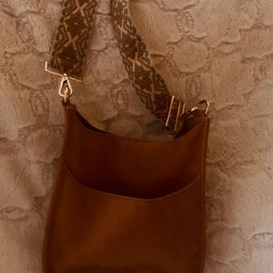 Faux Leather Crossbody bag with boho strap. Camel color.  Really cute.